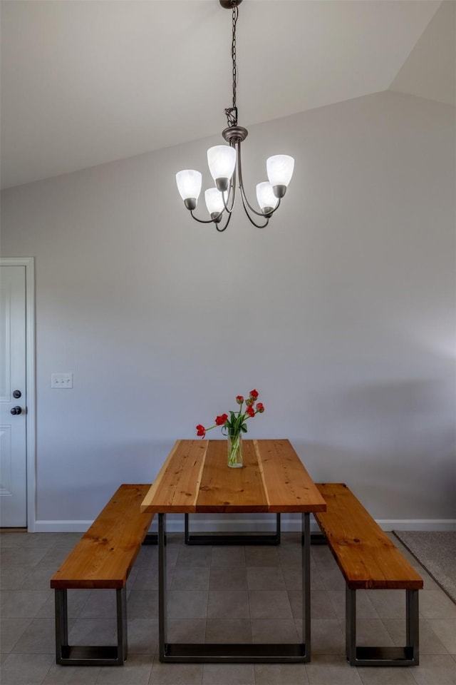 850 Pollux Rd, Helena, MT 59602 - tiled dining area featuring a chandelier, baseboards, and lofted ceiling