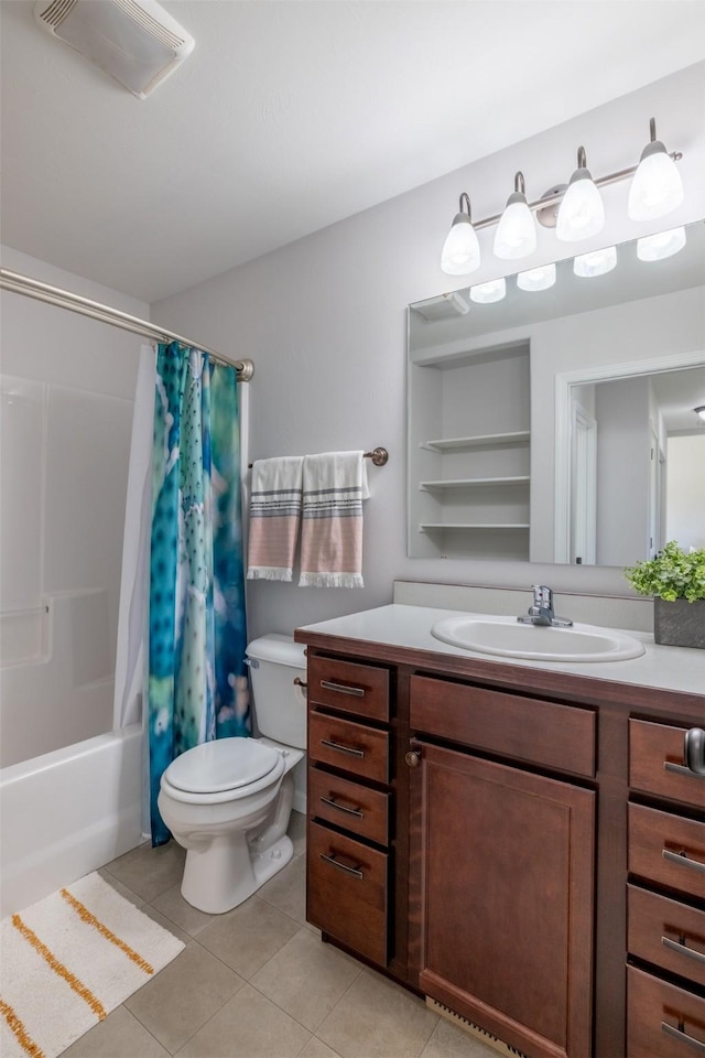 850 Pollux Rd, Helena, MT 59602 - bathroom featuring toilet, vanity, tile patterned floors, and shower / tub combo