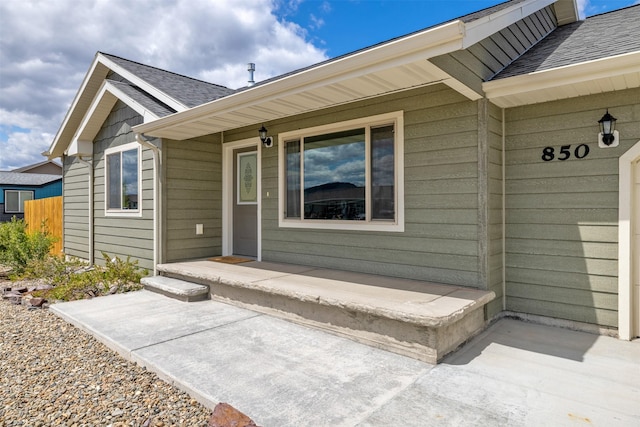 850 Pollux Rd, Helena, MT 59602 - property entrance with a shingled roof