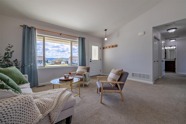 850 Pollux Rd, Helena, MT 59602 - carpeted living area featuring lofted ceiling and baseboards