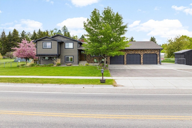 4884 Lower Miller Creek Rd, Missoula, MT 59803 - view of front of house with driveway and an attached garage