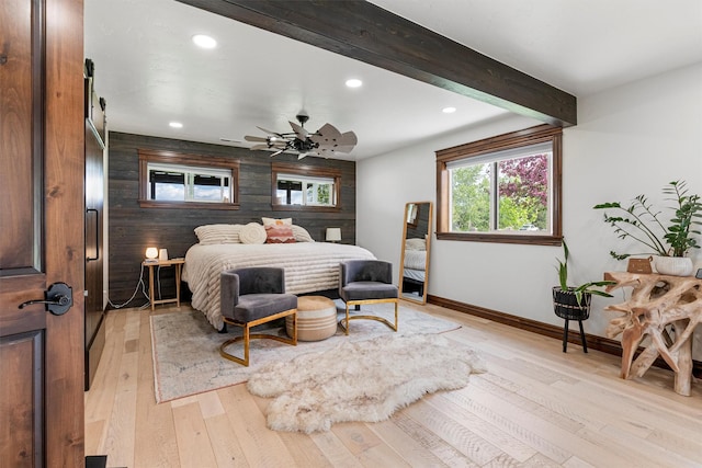 4884 Lower Miller Creek Rd, Missoula, MT 59803 - bedroom with recessed lighting, light wood-style flooring, wooden walls, an accent wall, and beamed ceiling
