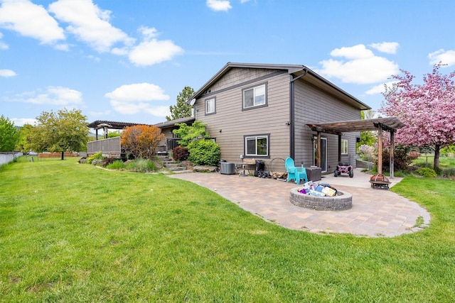 4884 Lower Miller Creek Rd, Missoula, MT 59803 - back of property featuring an outdoor fire pit, a pergola, and a patio