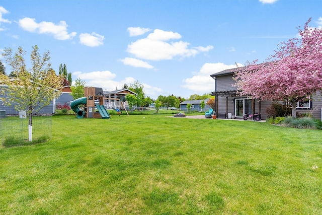 4884 Lower Miller Creek Rd, Missoula, MT 59803 - view of yard featuring a pergola and a playground
