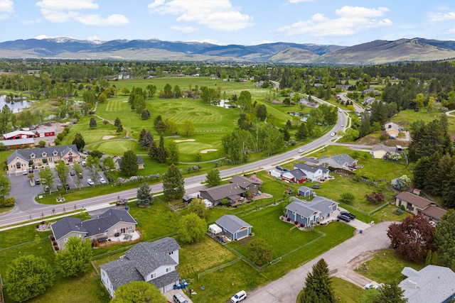 4884 Lower Miller Creek Rd, Missoula, MT 59803 - aerial overview of property's location with nearby suburban area, a water and mountain view, and a golf course