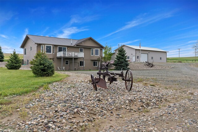 33 Windy Meadow Dr, Townsend, MT 59644 - back of property featuring a balcony and metal roof