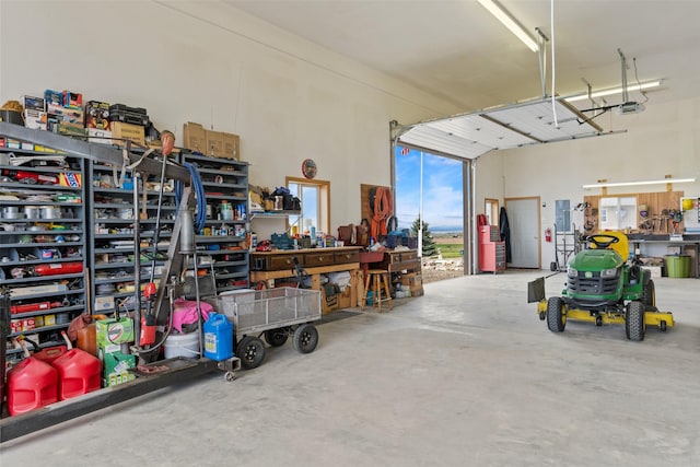 33 Windy Meadow Dr, Townsend, MT 59644 - garage with electric panel and a garage door opener
