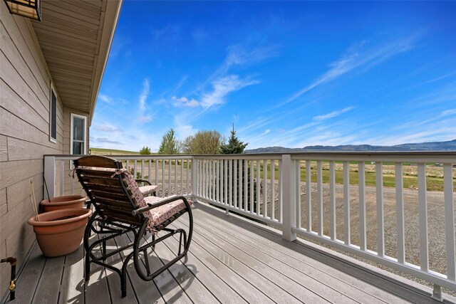 33 Windy Meadow Dr, Townsend, MT 59644 - deck featuring a mountain view