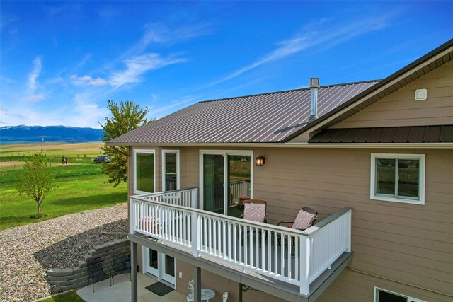 33 Windy Meadow Dr, Townsend, MT 59644 - rear view of house featuring a mountain view and metal roof