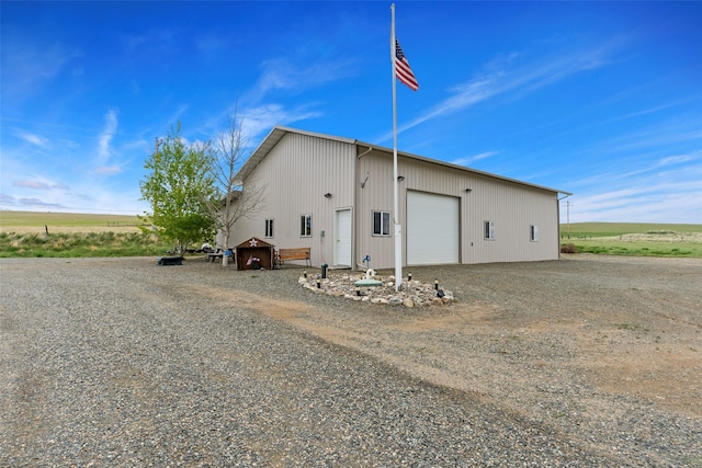 33 Windy Meadow Dr, Townsend, MT 59644 - view of home's exterior with an outbuilding and a detached garage