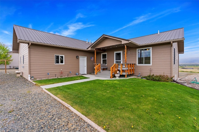 33 Windy Meadow Dr, Townsend, MT 59644 - ranch-style house featuring a front yard and metal roof