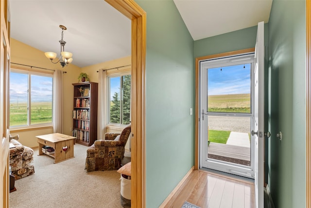 33 Windy Meadow Dr, Townsend, MT 59644 - entrance foyer featuring lofted ceiling, a chandelier, and baseboards