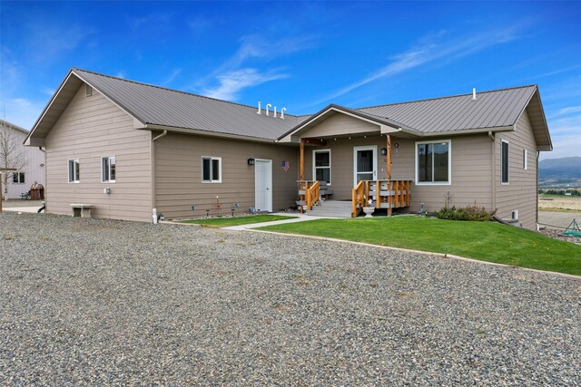33 Windy Meadow Dr, Townsend, MT 59644 - single story home with metal roof and a front lawn