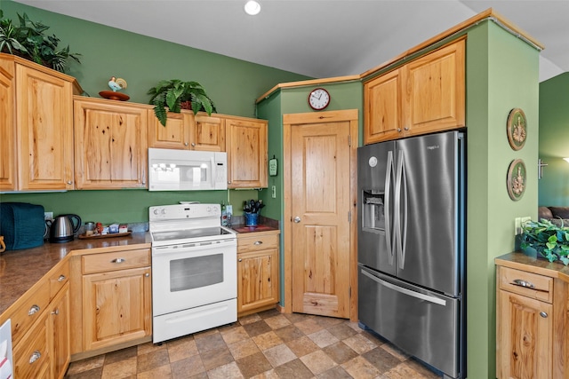 33 Windy Meadow Dr, Townsend, MT 59644 - kitchen featuring white appliances, stone finish flooring, dark countertops, and light brown cabinets