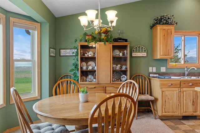 33 Windy Meadow Dr, Townsend, MT 59644 - dining space featuring a chandelier and plenty of natural light