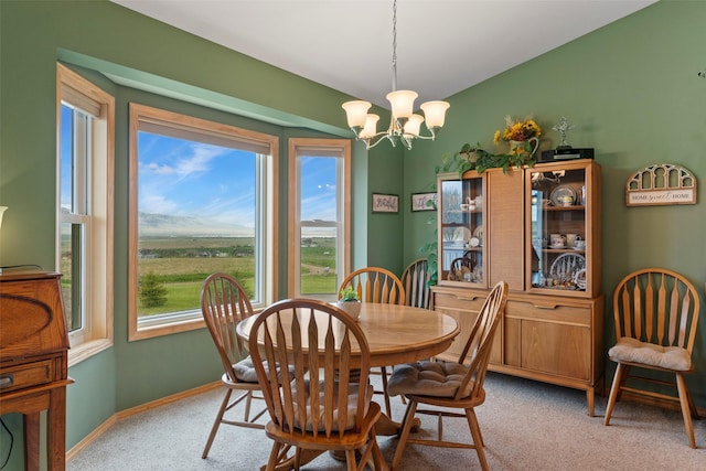 33 Windy Meadow Dr, Townsend, MT 59644 - dining room with light carpet, a chandelier, and baseboards