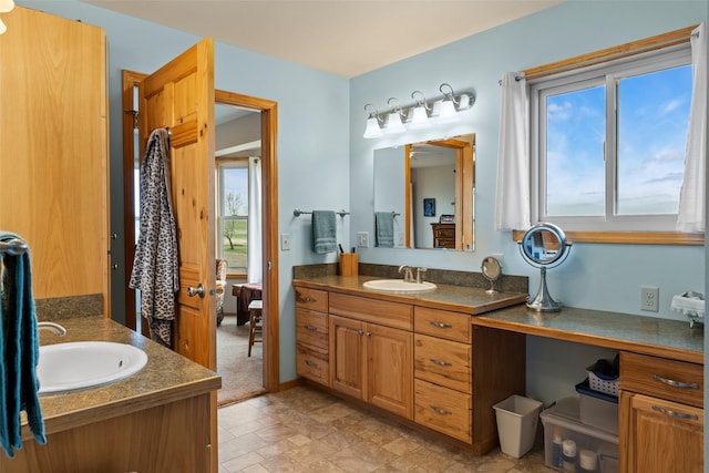 33 Windy Meadow Dr, Townsend, MT 59644 - full bath with two vanities, stone finish flooring, and connected bathroom