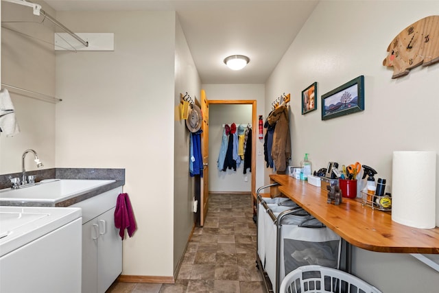 33 Windy Meadow Dr, Townsend, MT 59644 - laundry area with cabinet space, stone finish floors, baseboards, and washer / dryer