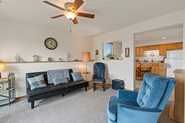 33 Windy Meadow Dr, Townsend, MT 59644 - living area featuring light carpet, ceiling fan, and baseboards