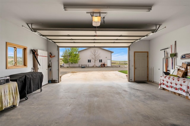 33 Windy Meadow Dr, Townsend, MT 59644 - garage featuring a garage door opener