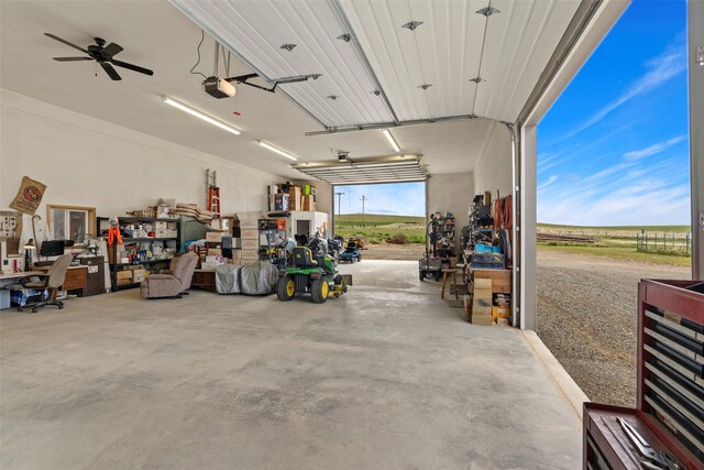 33 Windy Meadow Dr, Townsend, MT 59644 - garage featuring a garage door opener