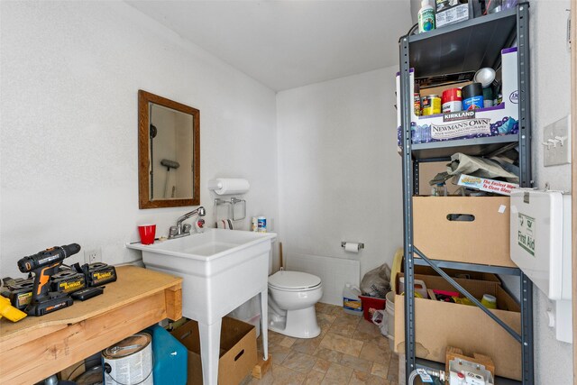 33 Windy Meadow Dr, Townsend, MT 59644 - bathroom with stone finish flooring and toilet