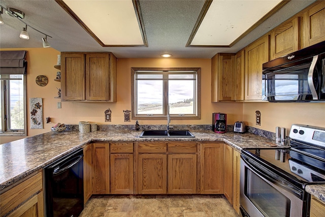 31521 Mcdonald Lake Rd, Saint Ignatius, MT 59865 - kitchen featuring stainless steel range with electric cooktop, dishwasher, a sink, brown cabinets, and a peninsula