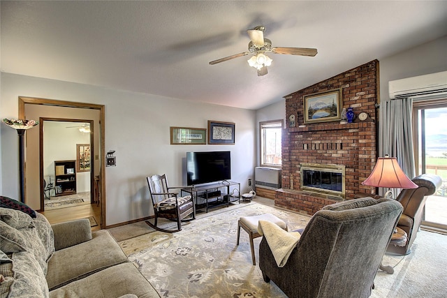 31521 Mcdonald Lake Rd, Saint Ignatius, MT 59865 - living area with a wall mounted AC, a ceiling fan, healthy amount of natural light, a fireplace, and lofted ceiling