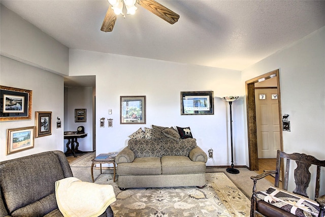 31521 Mcdonald Lake Rd, Saint Ignatius, MT 59865 - living room featuring ceiling fan, lofted ceiling, and baseboards