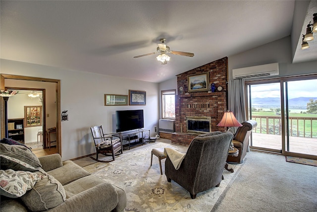31521 Mcdonald Lake Rd, Saint Ignatius, MT 59865 - living area featuring a wall mounted AC, a ceiling fan, lofted ceiling, and a fireplace