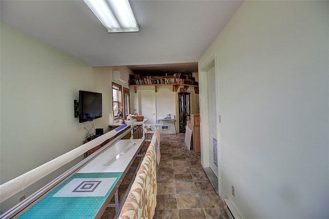 31521 Mcdonald Lake Rd, Saint Ignatius, MT 59865 - hallway featuring stone finish flooring and a wall unit AC