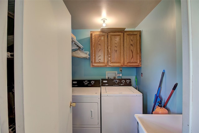 31521 Mcdonald Lake Rd, Saint Ignatius, MT 59865 - laundry area with separate washer and dryer and cabinet space