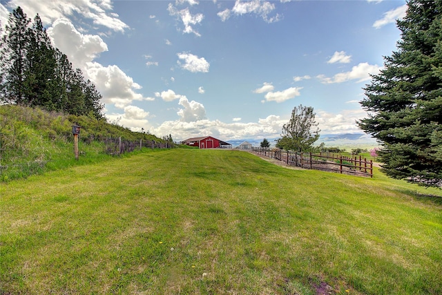 31521 Mcdonald Lake Rd, Saint Ignatius, MT 59865 - view of yard with a barn, a rural view, and an outbuilding