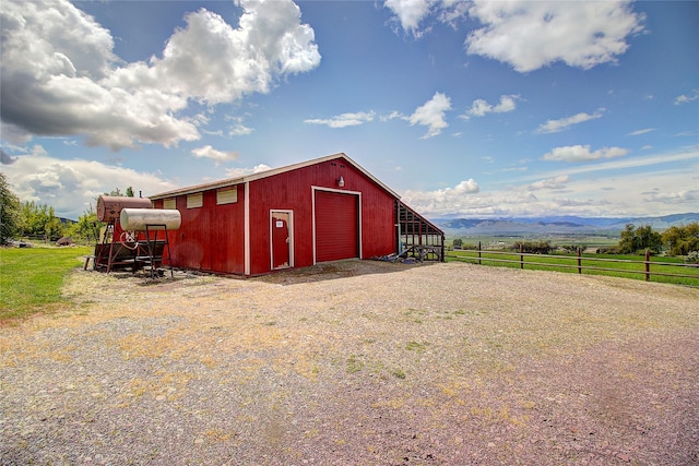 31521 Mcdonald Lake Rd, Saint Ignatius, MT 59865 - view of pole building featuring a mountain view