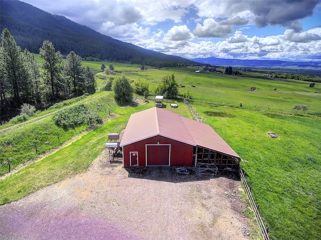 31521 Mcdonald Lake Rd, Saint Ignatius, MT 59865 - aerial view of sparsely populated area with a mountain backdrop