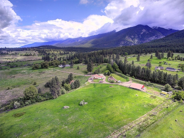 31521 Mcdonald Lake Rd, Saint Ignatius, MT 59865 - aerial view of sparsely populated area with mountains and a forest