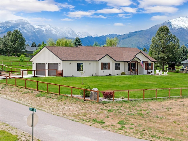 219 Rudys Way, Hamilton, MT 59840 - view of front facade with a mountain view and a detached garage