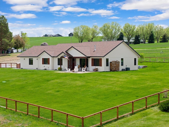 219 Rudys Way, Hamilton, MT 59840 - rear view of property featuring a patio area, central AC, and roof with shingles
