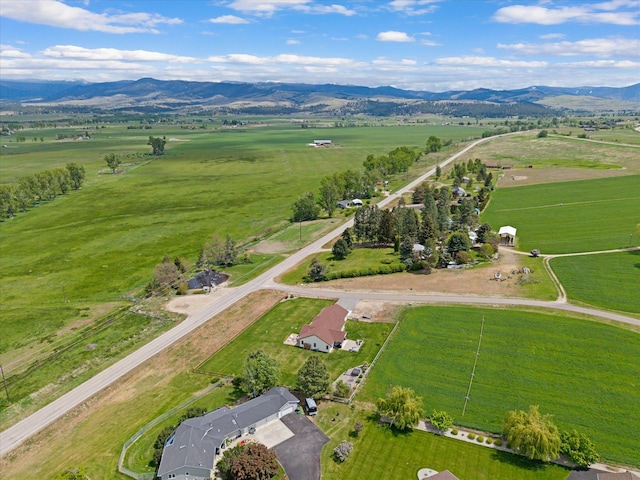 219 Rudys Way, Hamilton, MT 59840 - aerial view of property and surrounding area featuring rural landscape, mountains, and a pastoral area