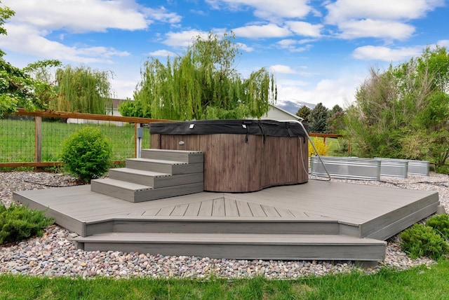 219 Rudys Way, Hamilton, MT 59840 - wooden deck featuring a hot tub