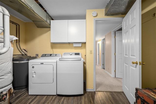 280 Hartt Hill Dr, Kalispell, MT 59901 - washroom with washing machine and dryer and dark wood-type flooring