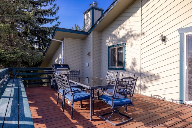 280 Hartt Hill Dr, Kalispell, MT 59901 - wooden terrace with outdoor dining space
