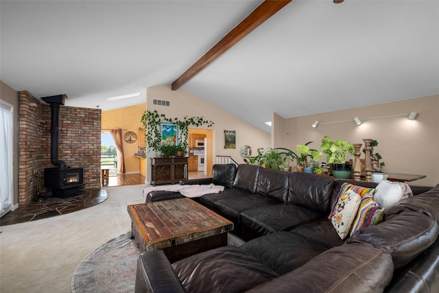 280 Hartt Hill Dr, Kalispell, MT 59901 - living area featuring carpet floors and a wood stove