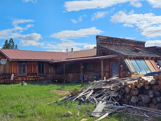 4870 4x4 Rd, Lincoln, MT 59639 - back of house with metal roof