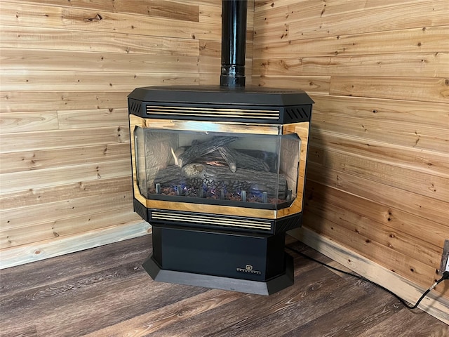 14367 US Highway 2 E, Essex, MT 59916 - detailed view of a wood stove, wood finished floors, and wooden walls