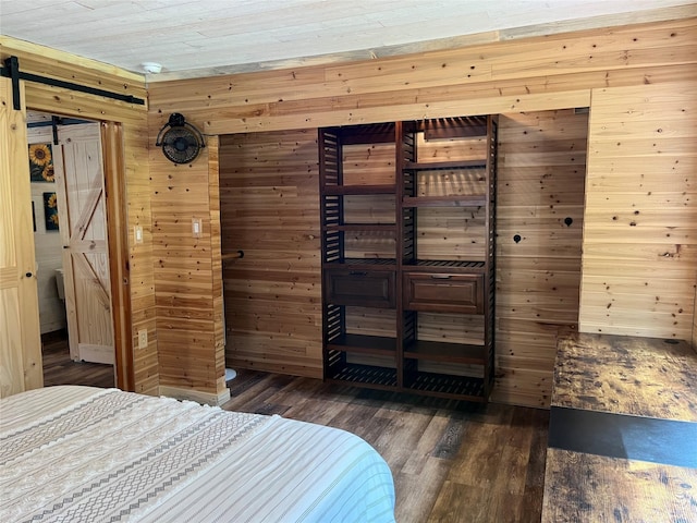 14367 US Highway 2 E, Essex, MT 59916 - bedroom featuring wood walls, dark wood-type flooring, and a relaxing sauna