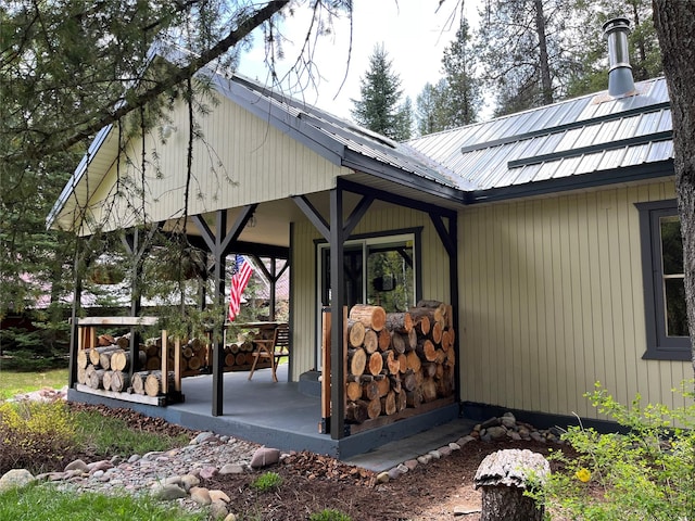 14367 US Highway 2 E, Essex, MT 59916 - view of side of property with metal roof and covered porch