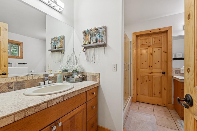 14132 Pine St, Bigfork, MT 59911 - bathroom featuring vanity, a shower stall, and tile patterned flooring