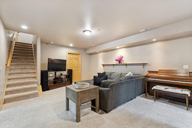 14132 Pine St, Bigfork, MT 59911 - living area with light carpet, recessed lighting, and stairway