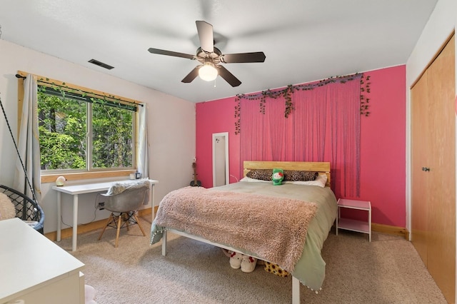 14132 Pine St, Bigfork, MT 59911 - carpeted bedroom featuring a closet and a ceiling fan